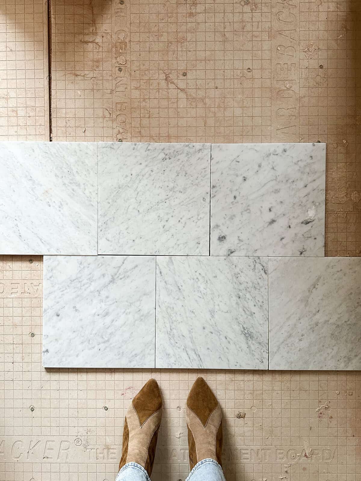 carrara marble floors staggered layout