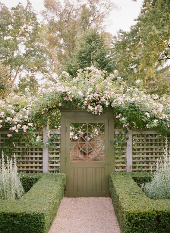 arbor with florals in colonial garden