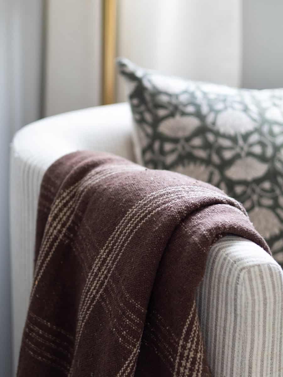 colorful guest bedroom layered textiles